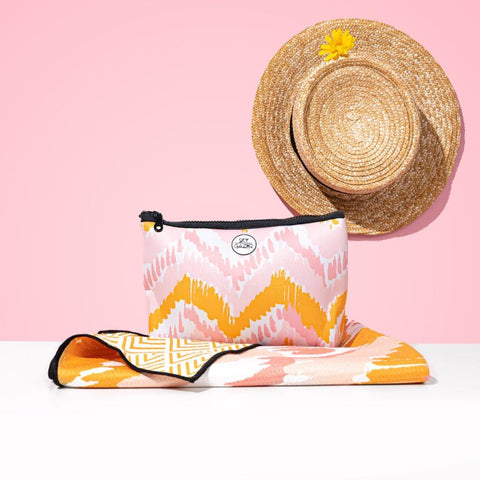 Sky Gazer sand free towel with zipped wet bag, pink, yellow and white chevrons, design called The Airlie.