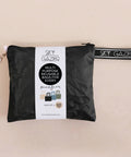 Black reusable bag pouch containing 4 shopping bags and trolley token with 'Sky Gazer' branding on a beige background